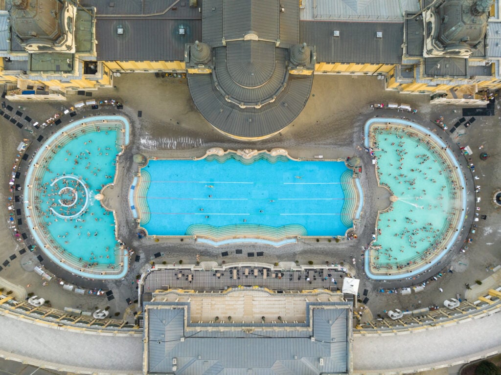 People in Water Pool. Drone Point of View.
